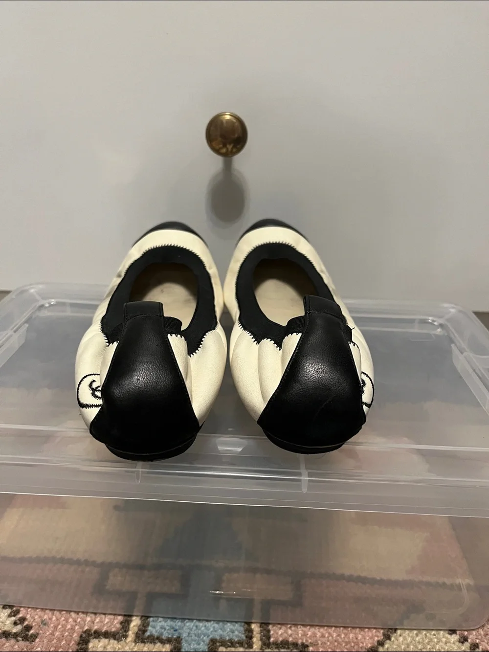 CHANEL Cream Leather Ballet Flats with Black Cap Toes